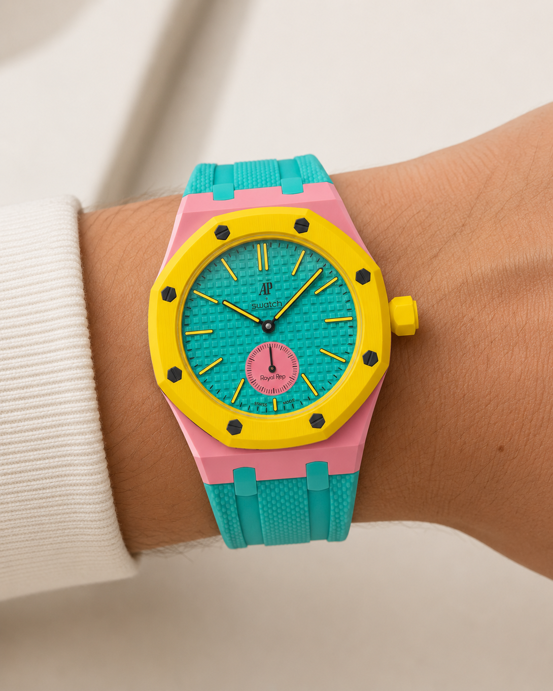 Turquoise, Pink & Yellow strap on wrist